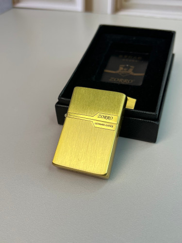 فندک طرح ساده طلایی زورو با بدنه استیل